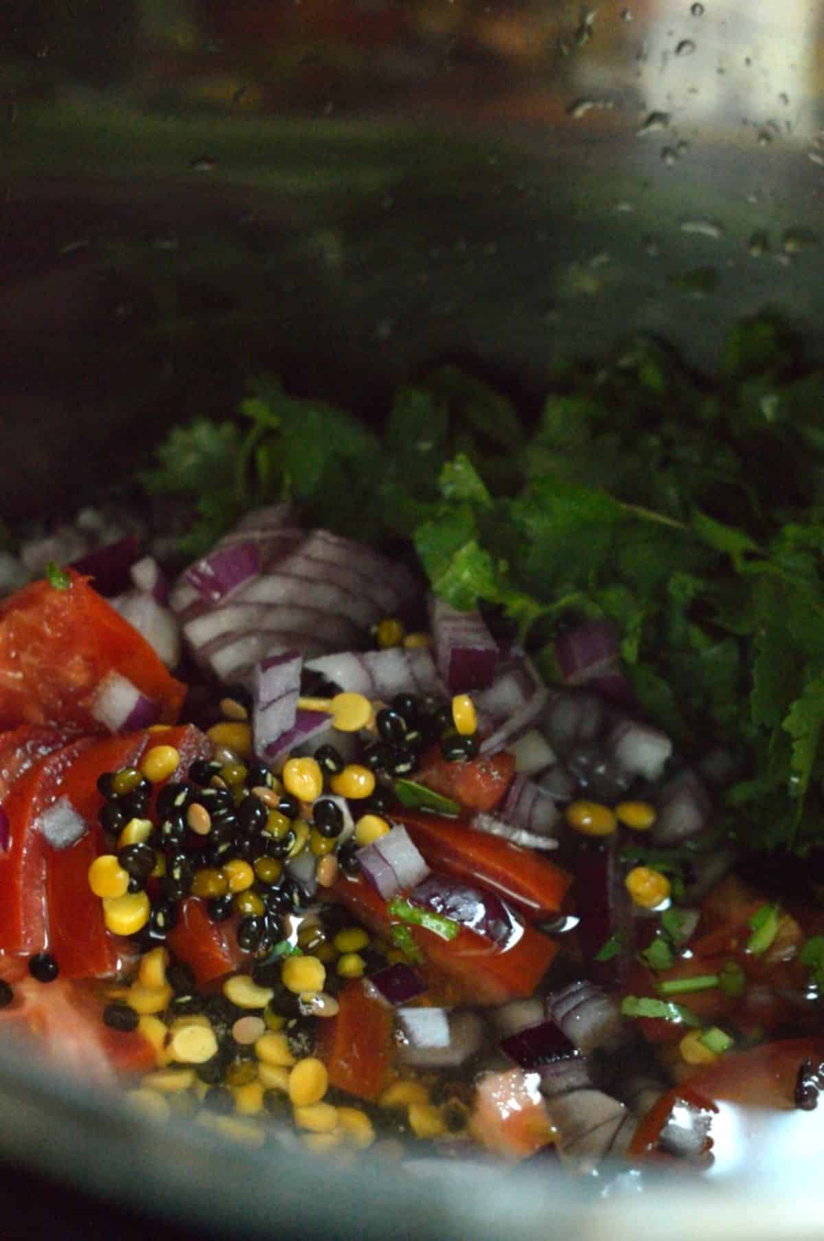 Dal Makhni ingredients cooking in a pot.