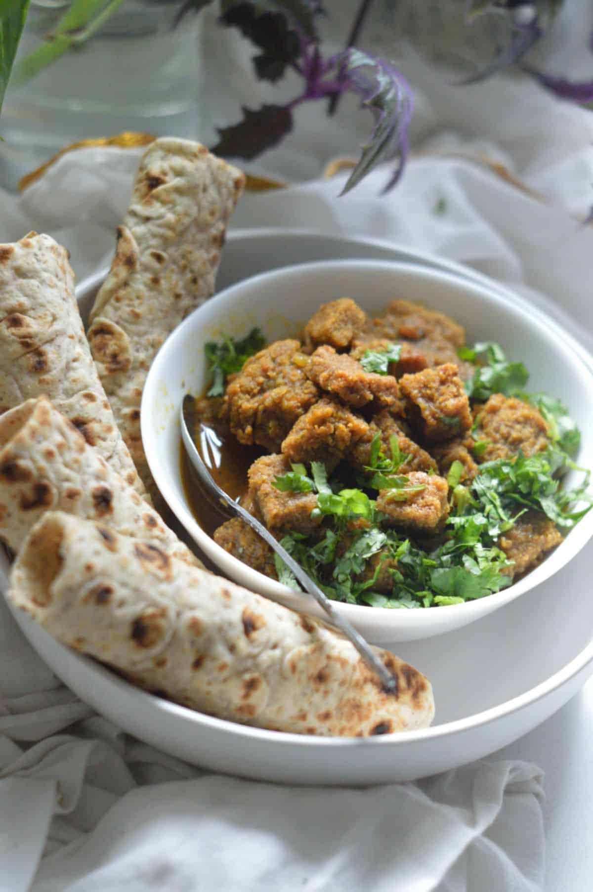 Dhoka Dalna dish in a white bowl.