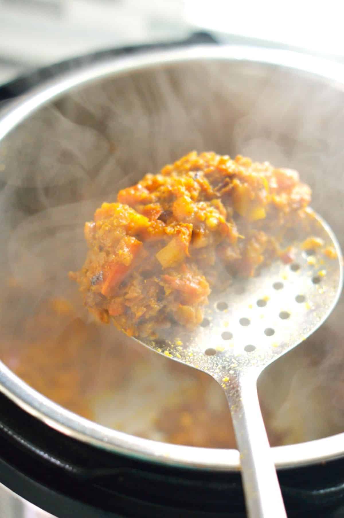 Gobi Paneer dish on a spatula.