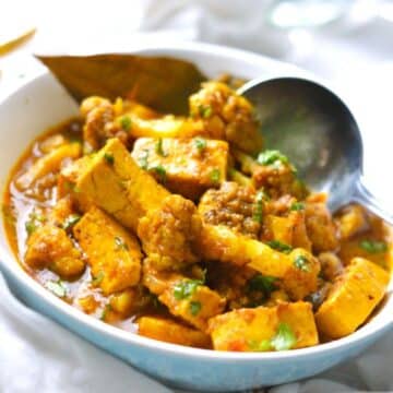 Gobi Paneer dish in a blue-white bowl.