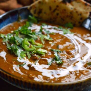 Dal Makhni dish in a blue bowl.