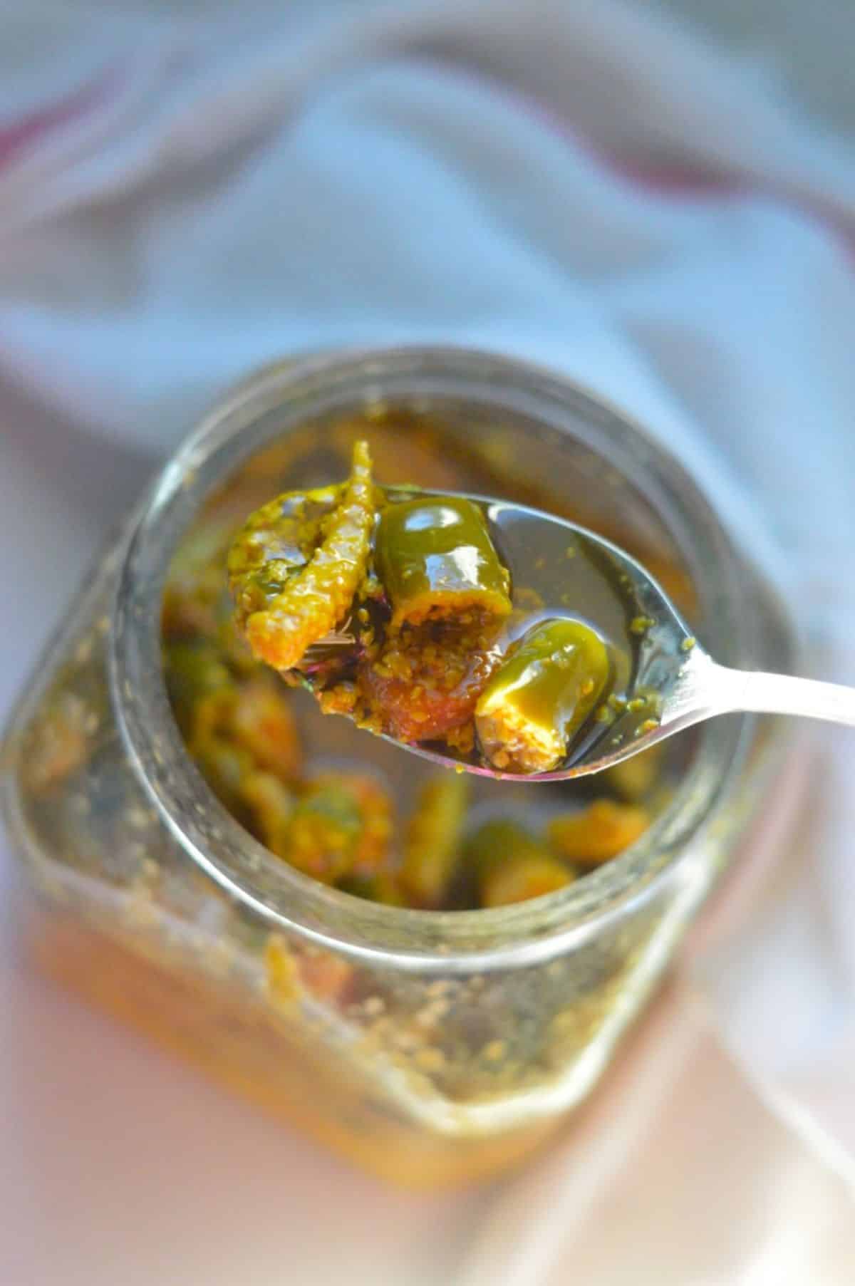 Indian Mixed Pickles on a spoon.