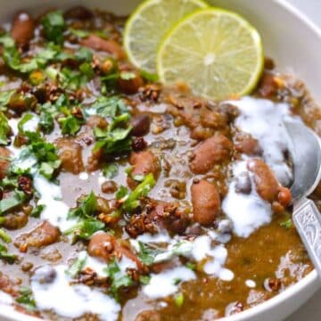 Madras Lentils dish in a white bowl.