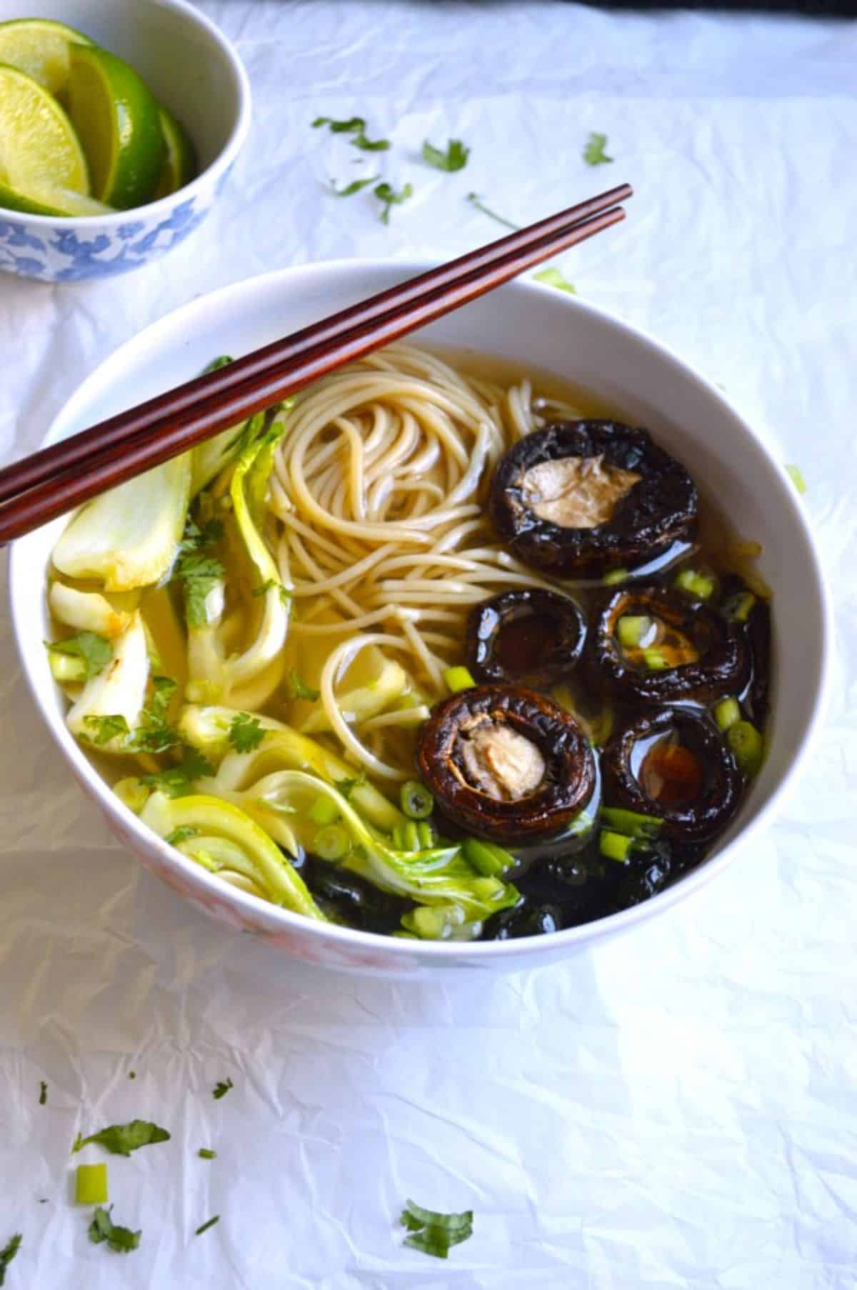 Masala Ramyun dish in a white bowl with chopsticks.