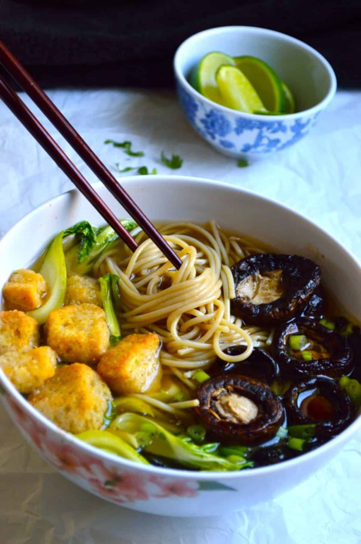 Masala Ramyun dish in a white bowl with chopsticks.