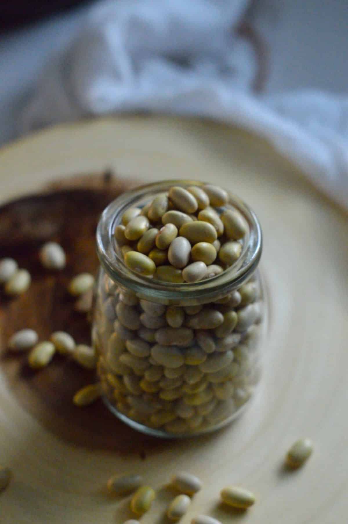 Mayocoba Beans in a glass jar.