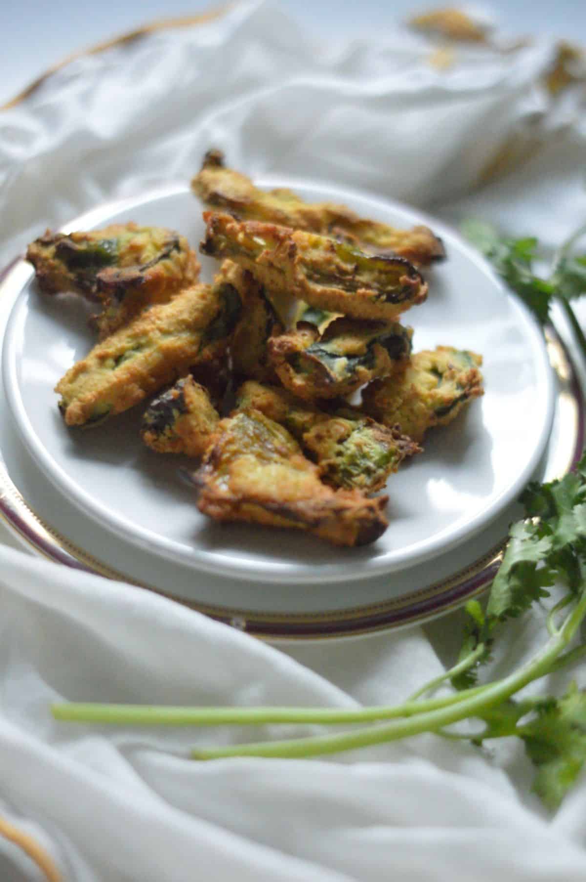 Air-Fryer Mirchi Vada on a white plate.