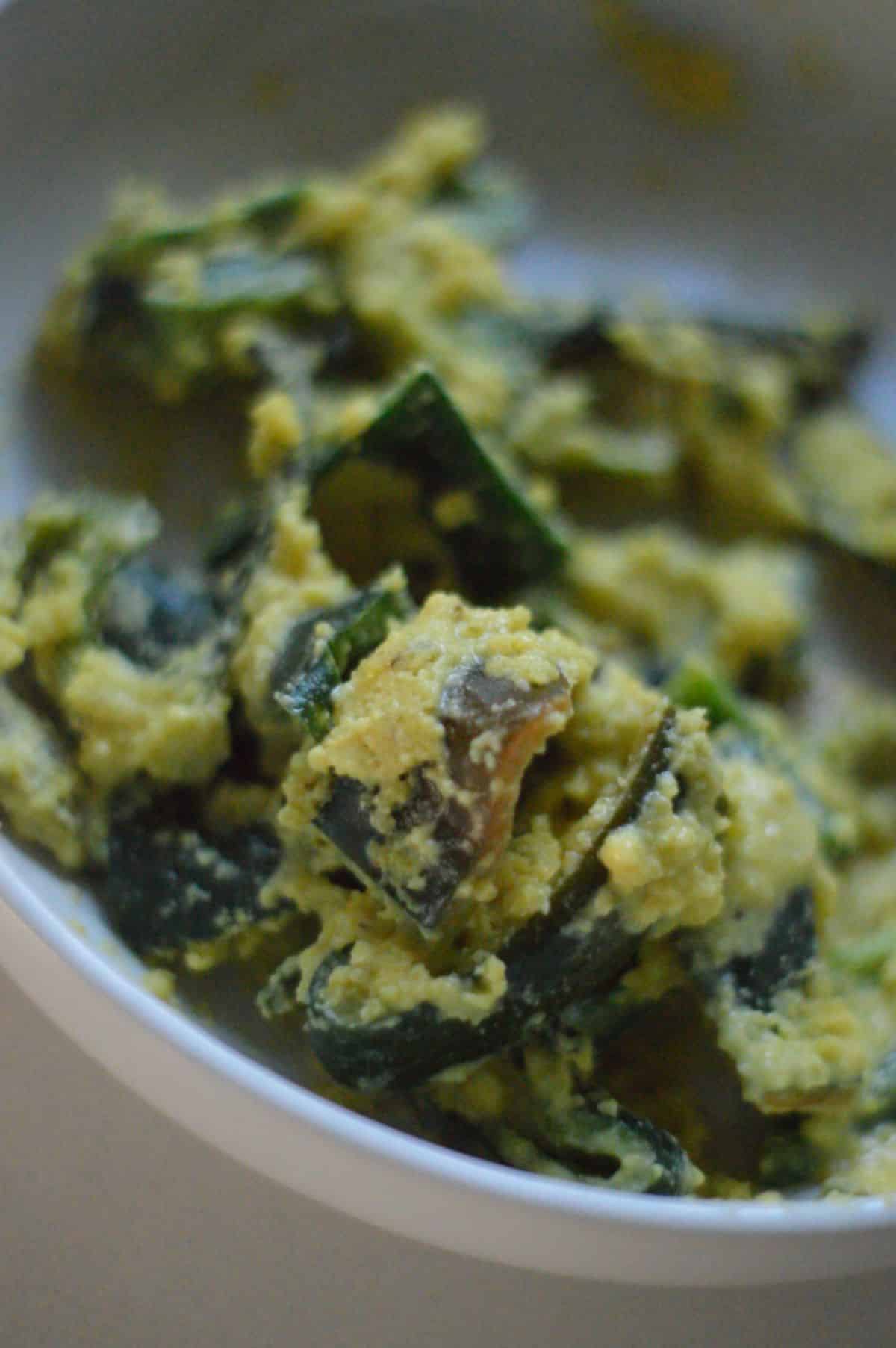 Sliced green pepper covered with Mirchi Vada batter.