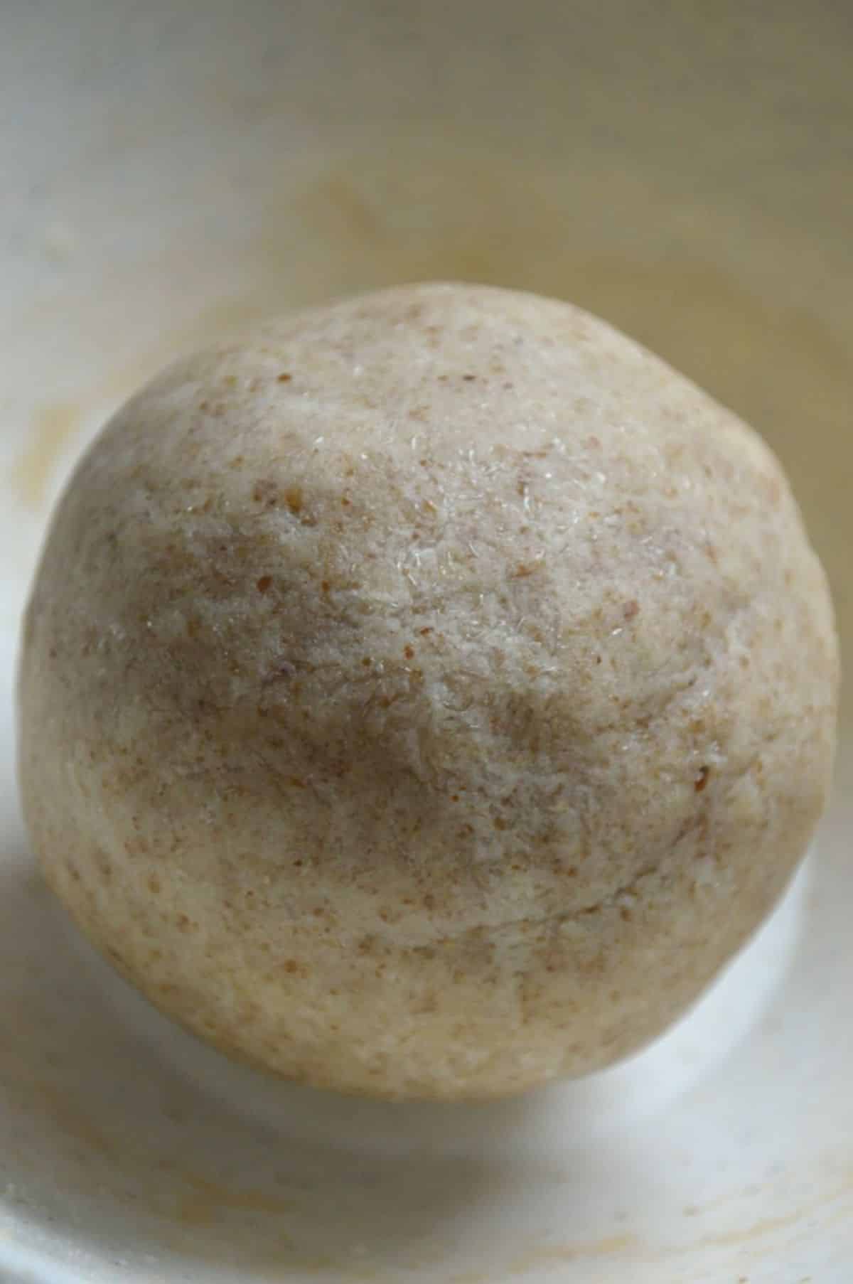 A ball of keto dough in a bowl.