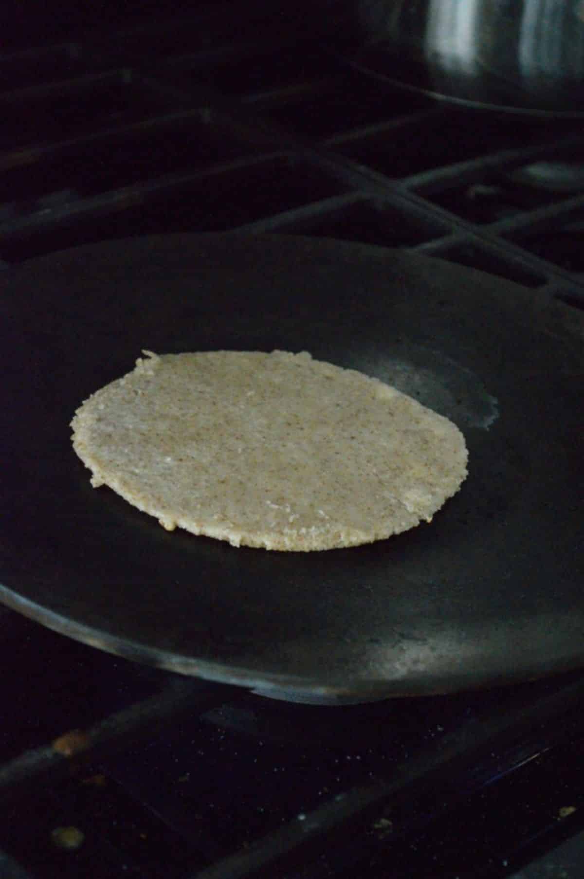 A keto dough baking on a pan.