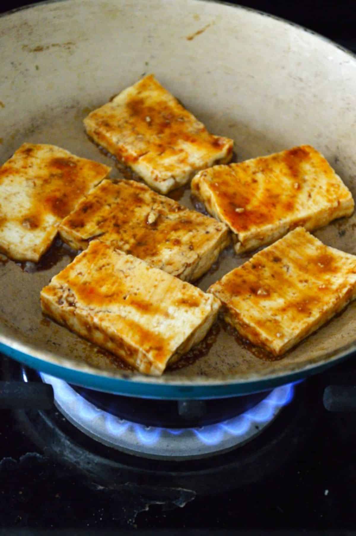 Pan-Fried Sesame Garlic Tofu in a pot.