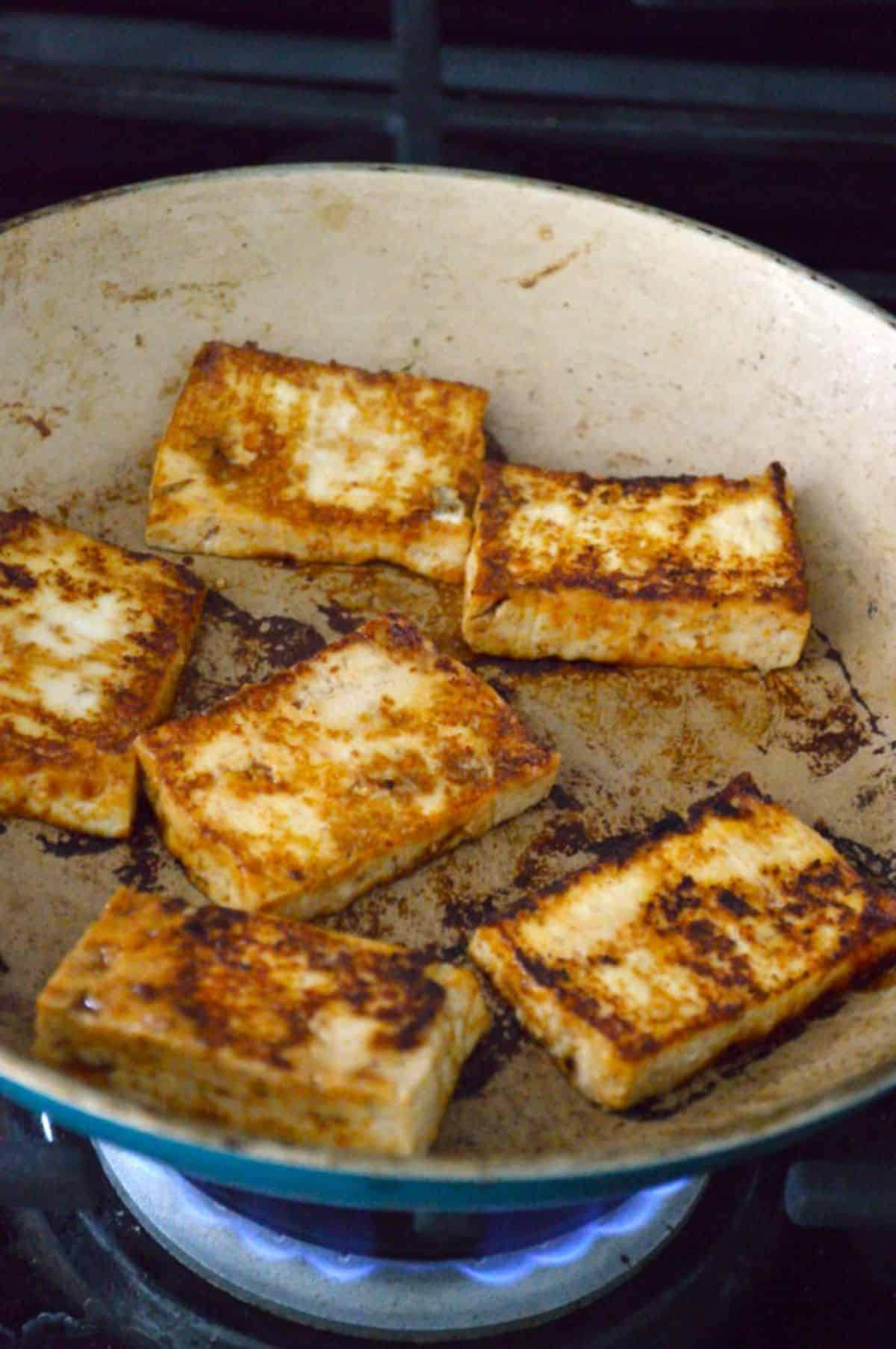 Pan-Fried Sesame Garlic Tofu in a pot.