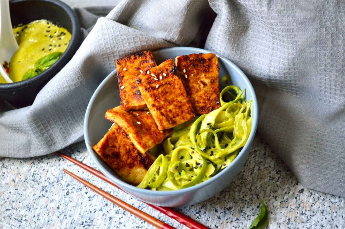 Pan-Fried Sesame Garlic Tofu in a blue bowl.