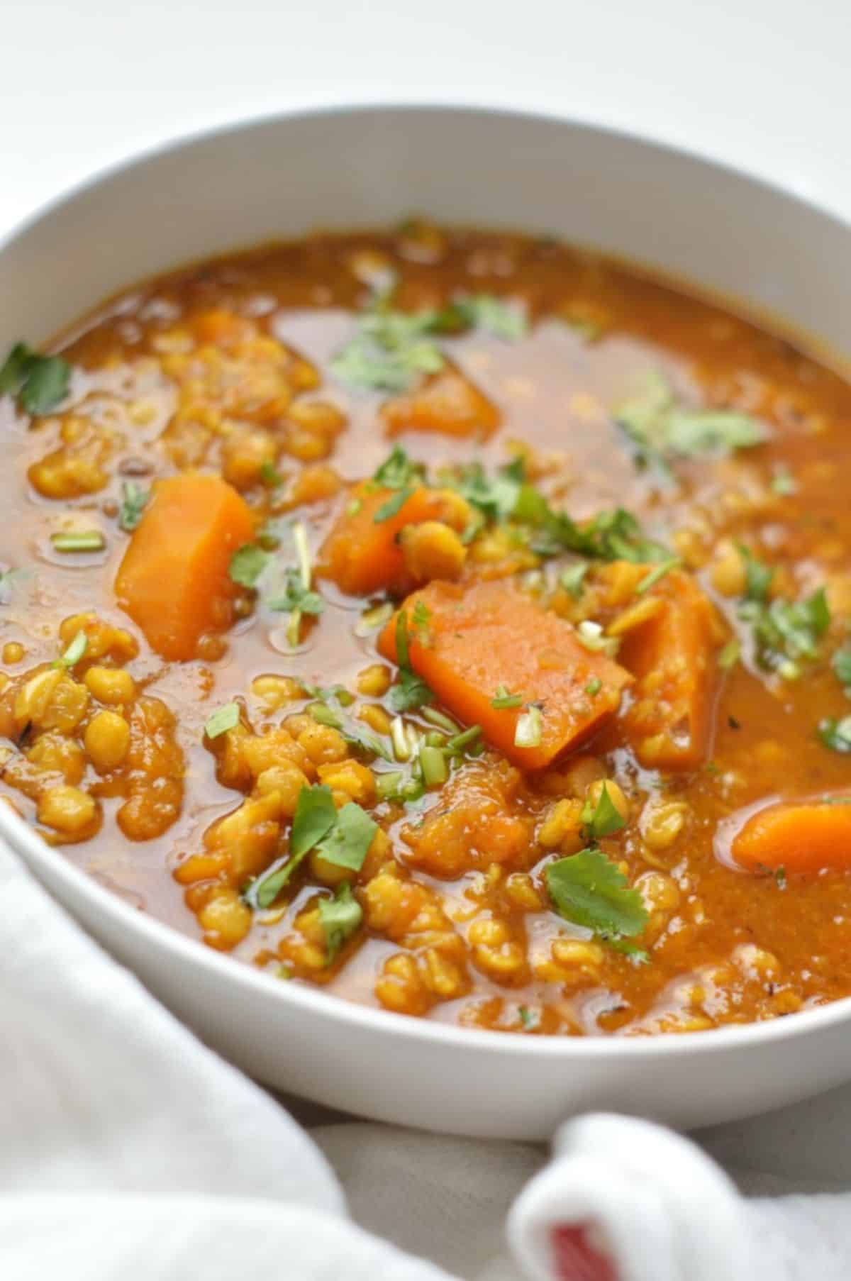 Pumpkin Chana Dal in a white bowl.