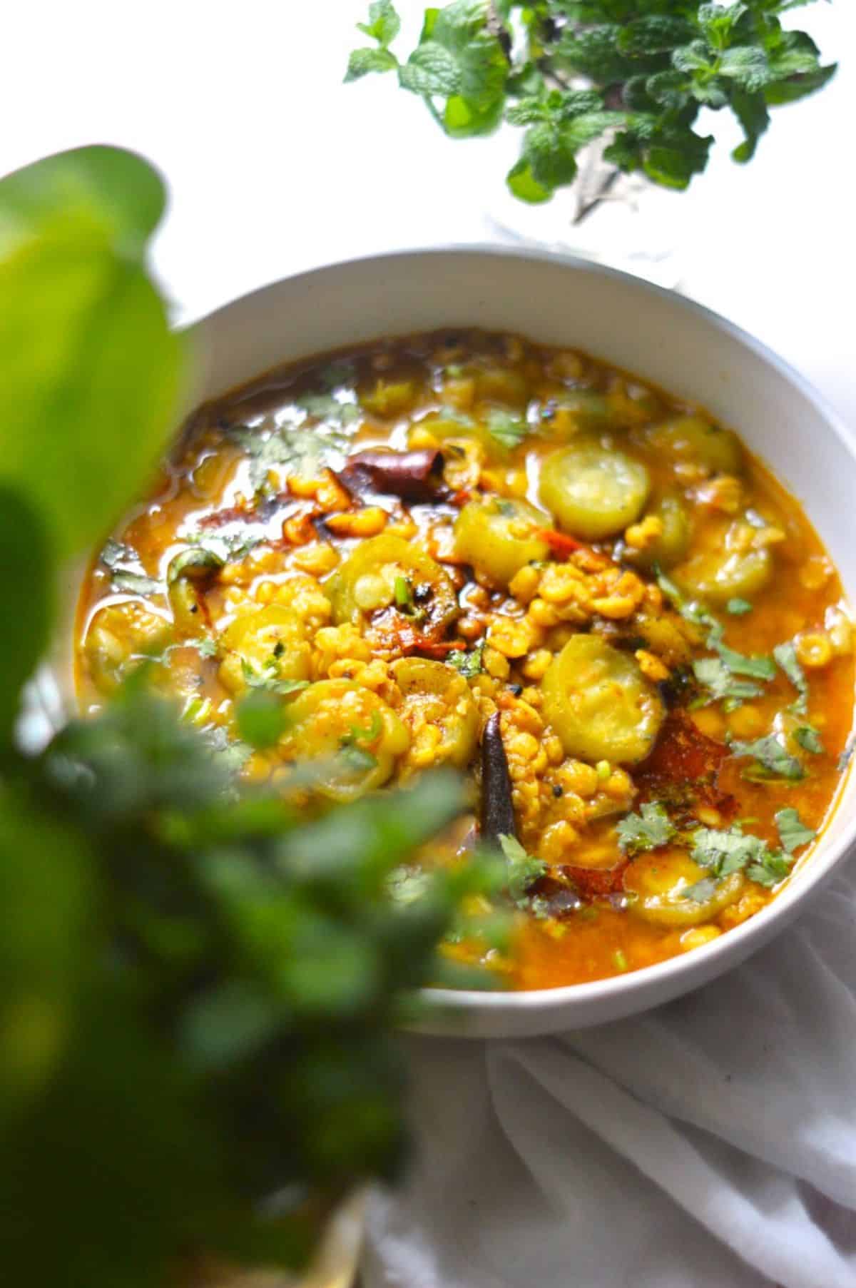 Ridge Gourd Chana Dal in a white bowl.