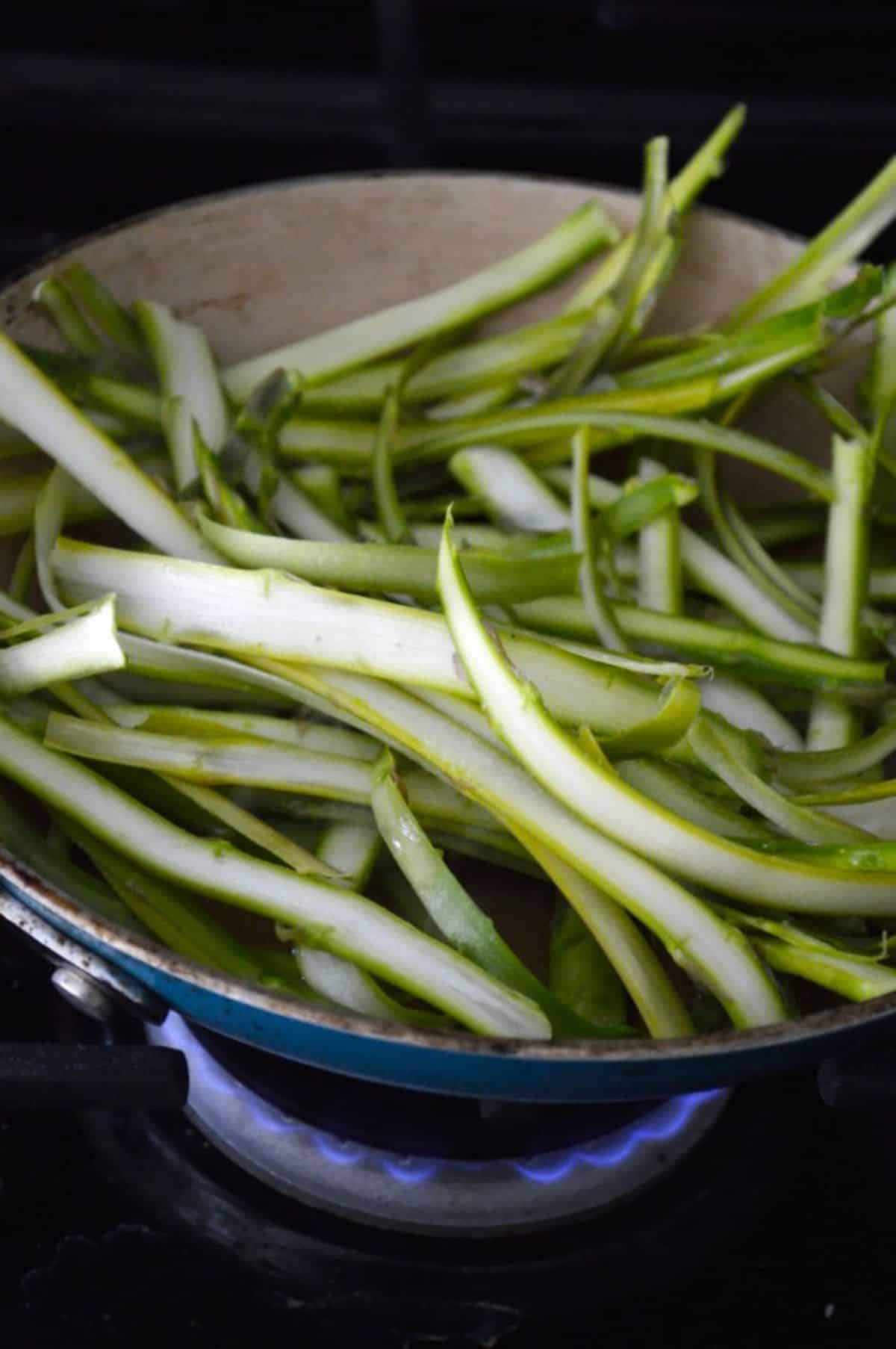 Shaved Asparagus in a pot.