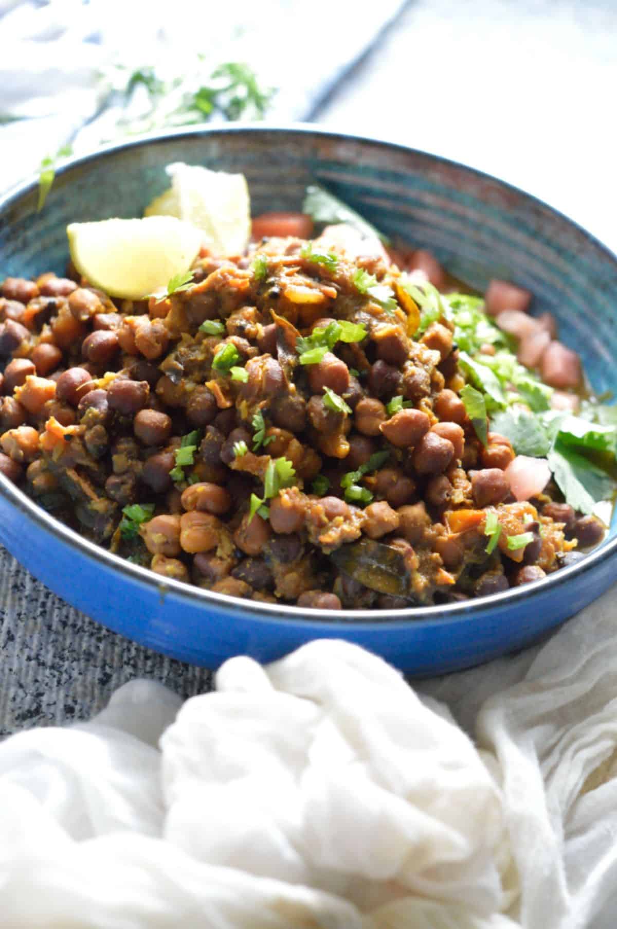 Sukha Chana dish in a blue bowl.