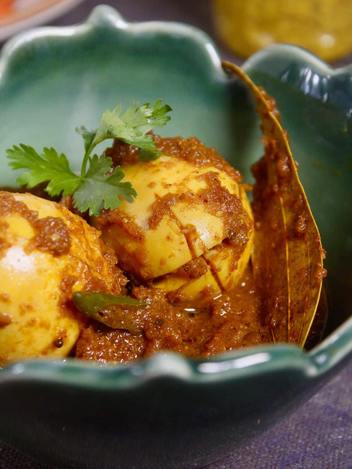 super zoom in image of egg curry with kasundi