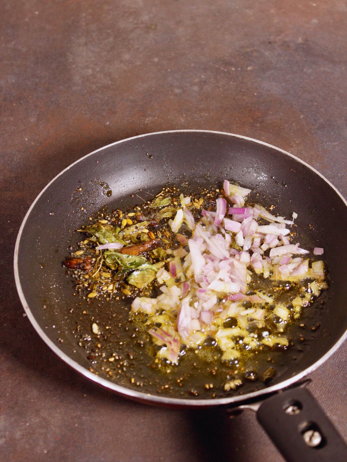 add chopped onions to the pan and saute 