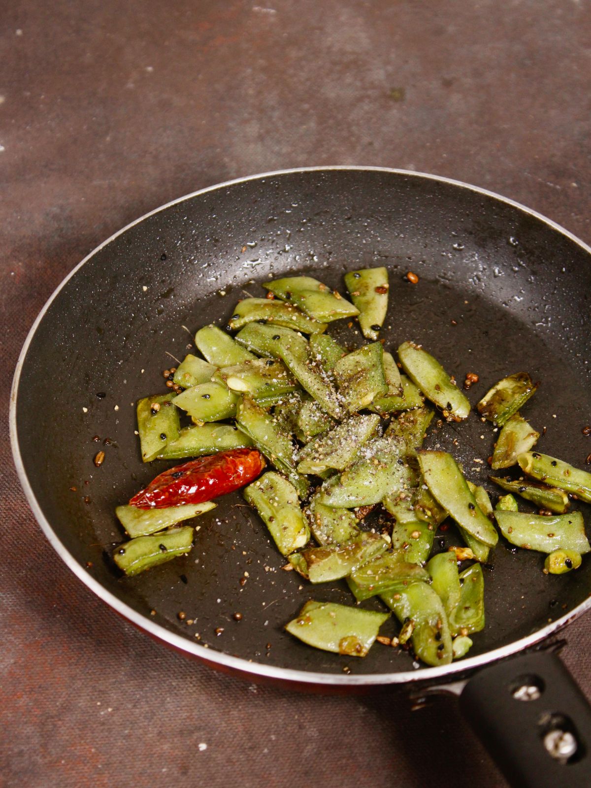 add salt and pepper to the pan 