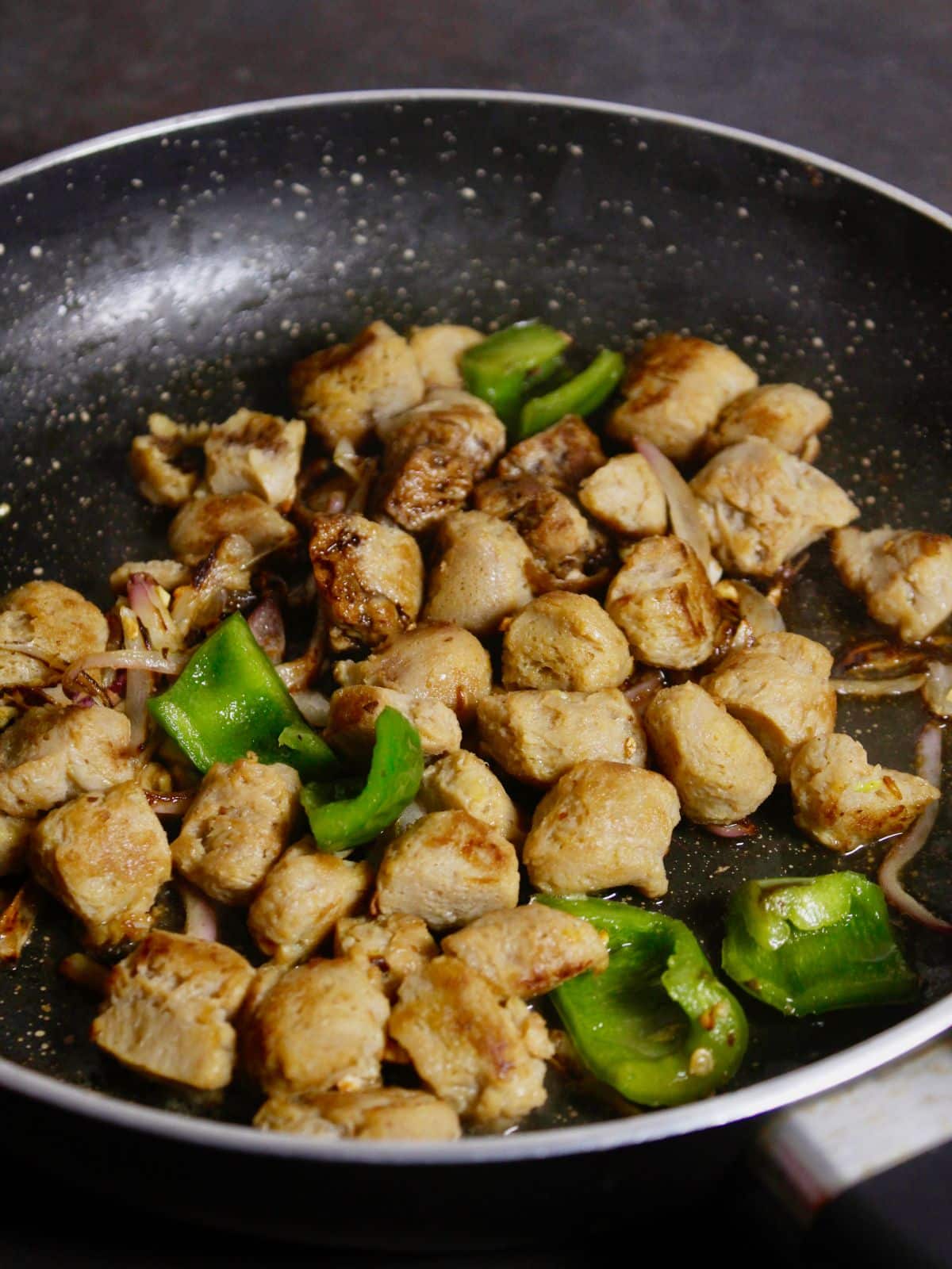 add soya chunks to the pan and mix well 