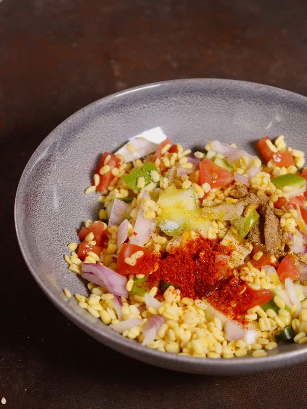 mix well all the vegetables and powdered spices to the bowl 