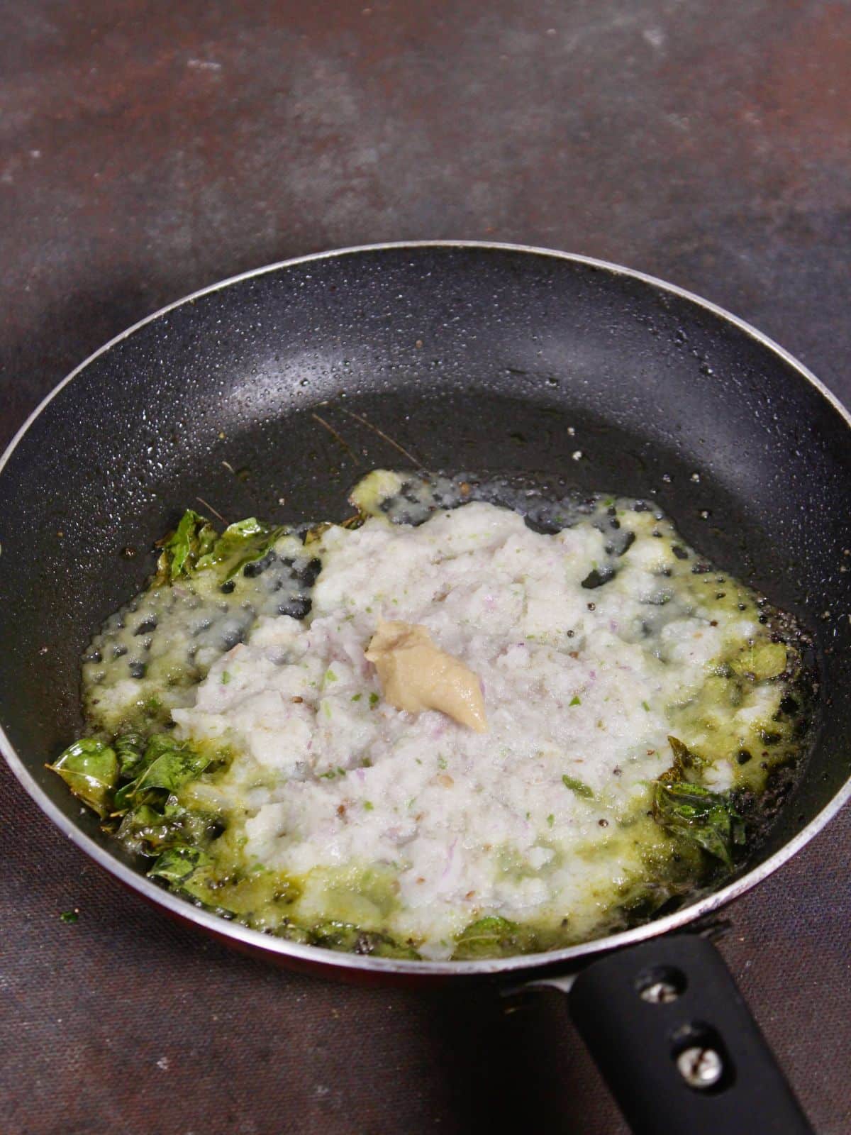 add onion and ginger garlic paste to the pan and saute  