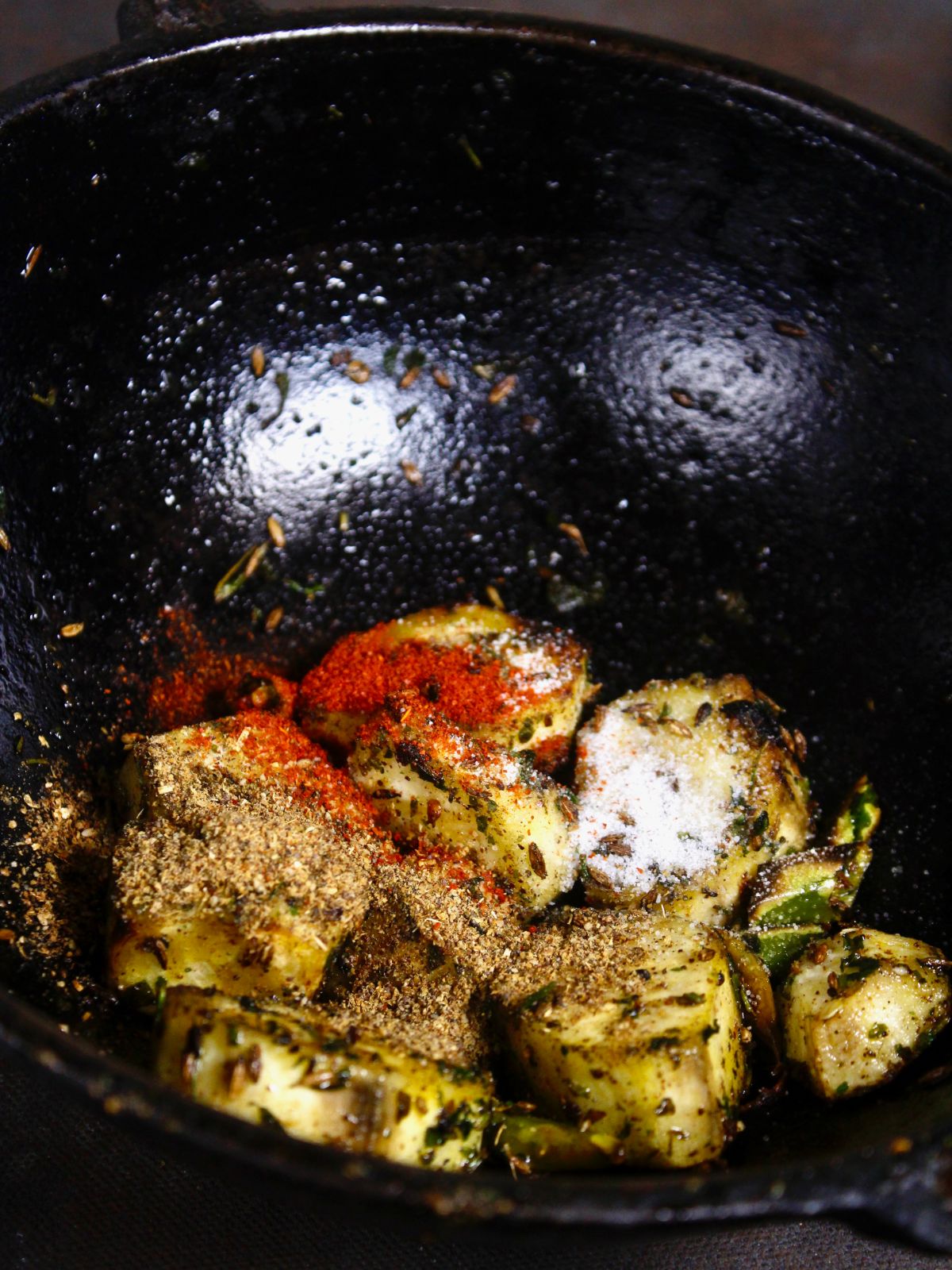 add powdered spices to the pan and mix well 