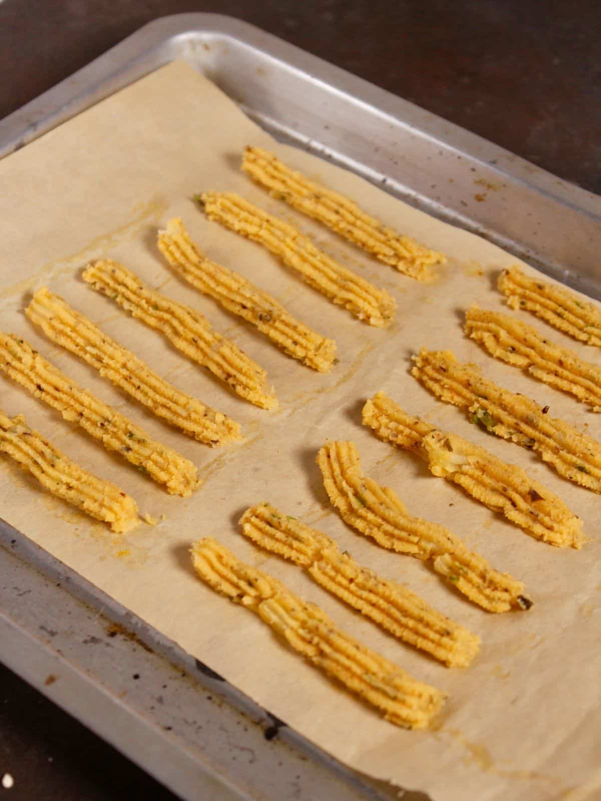 make line on a baking tray over a parchment paper 