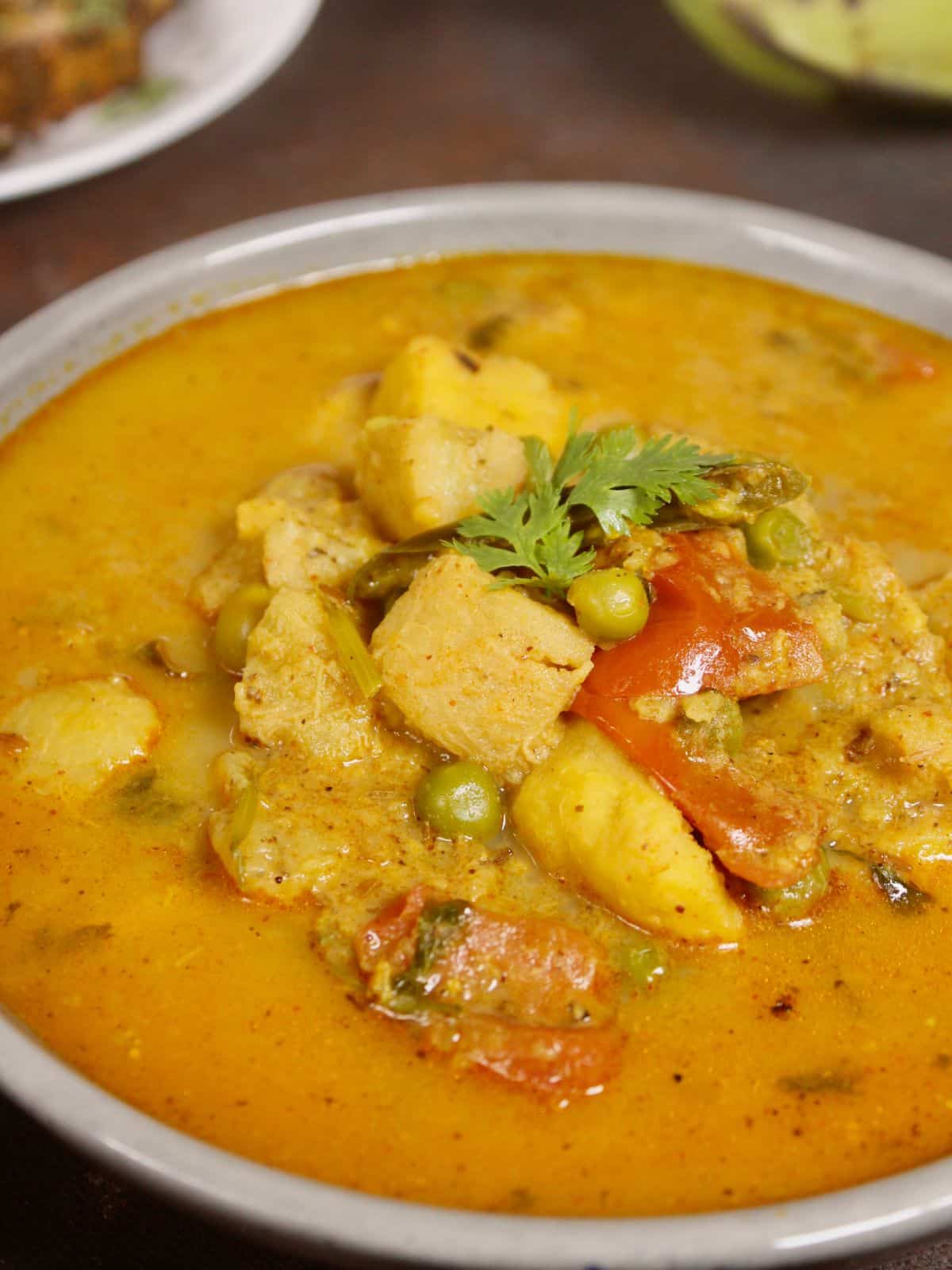 top view of raw banana and yam curry