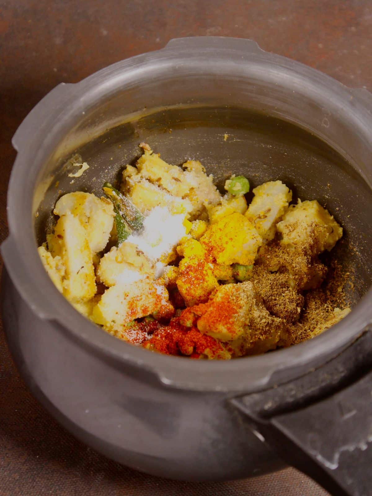 add powdered spices to the pot and cook 