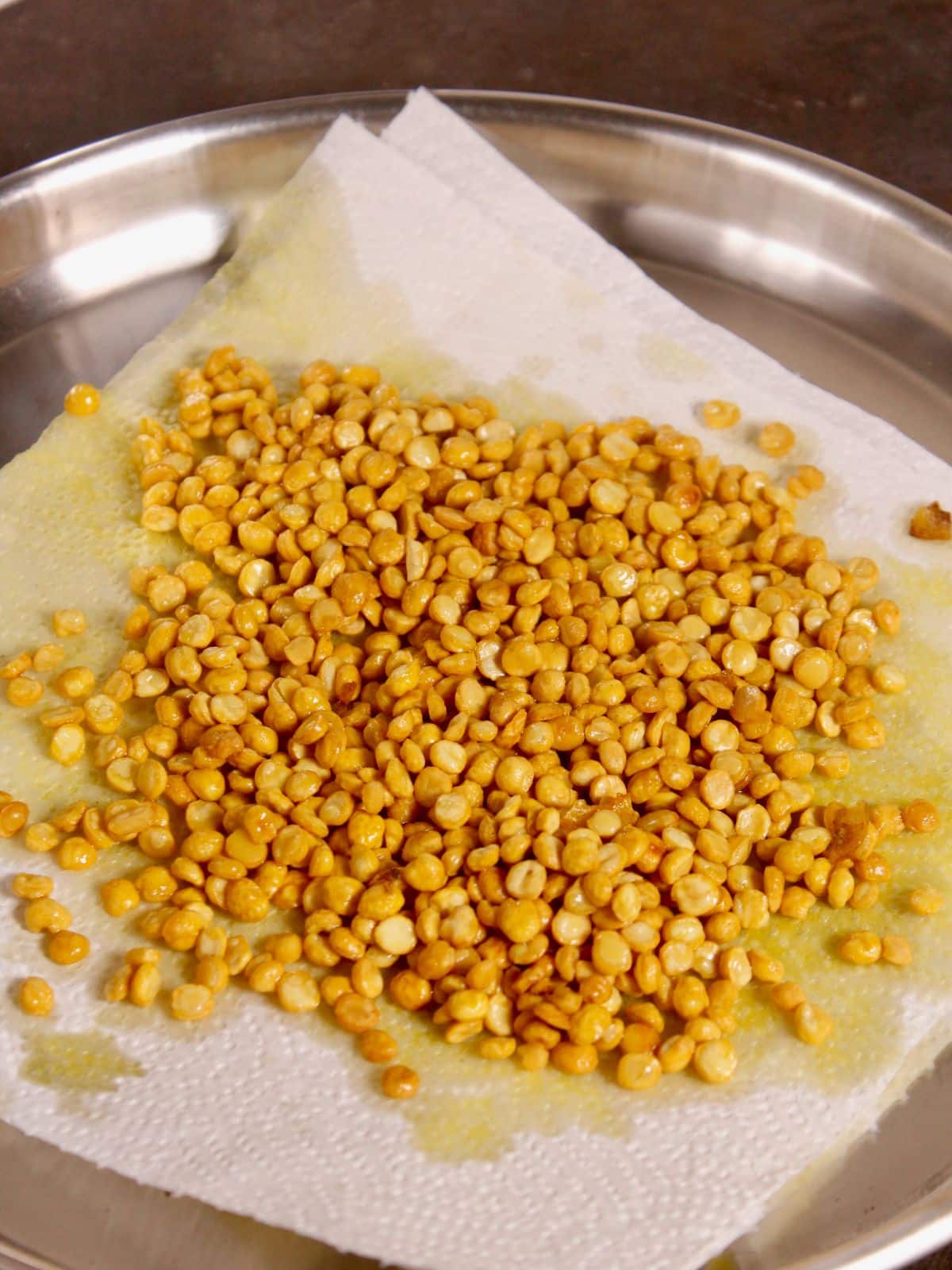 soak fried chana dal to remove excess oil 