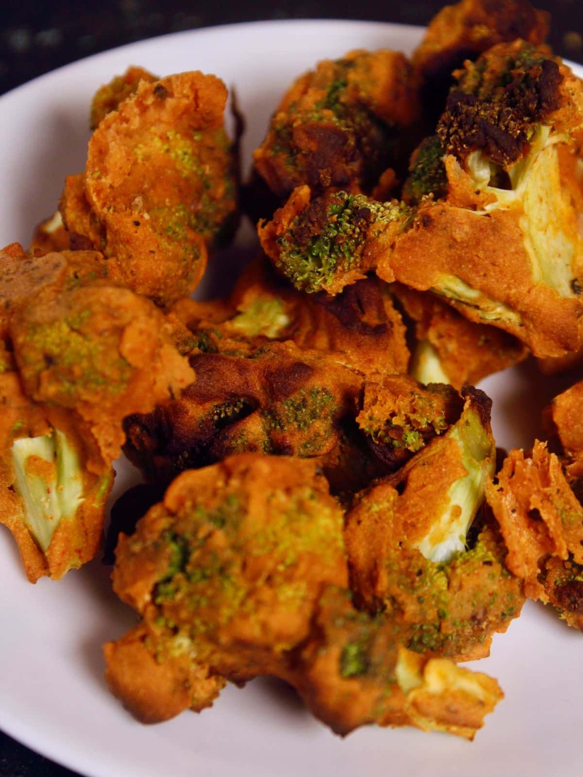 top view of air fried buffalo broccoli bites