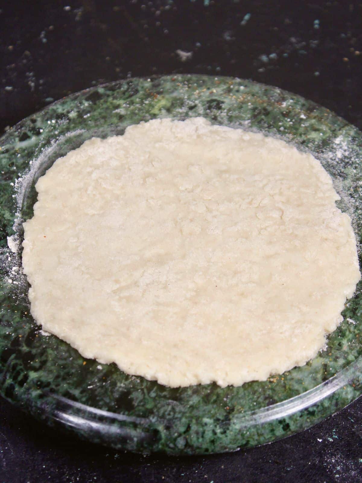 knead the dough and flatten it  