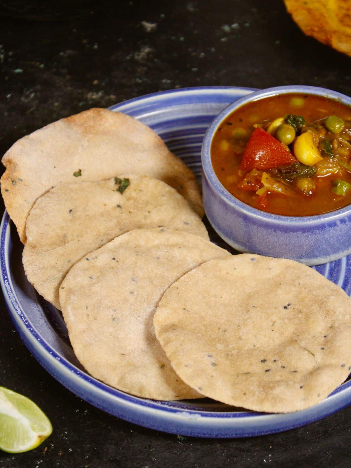 zoom in image of air fried pooris with sabzi