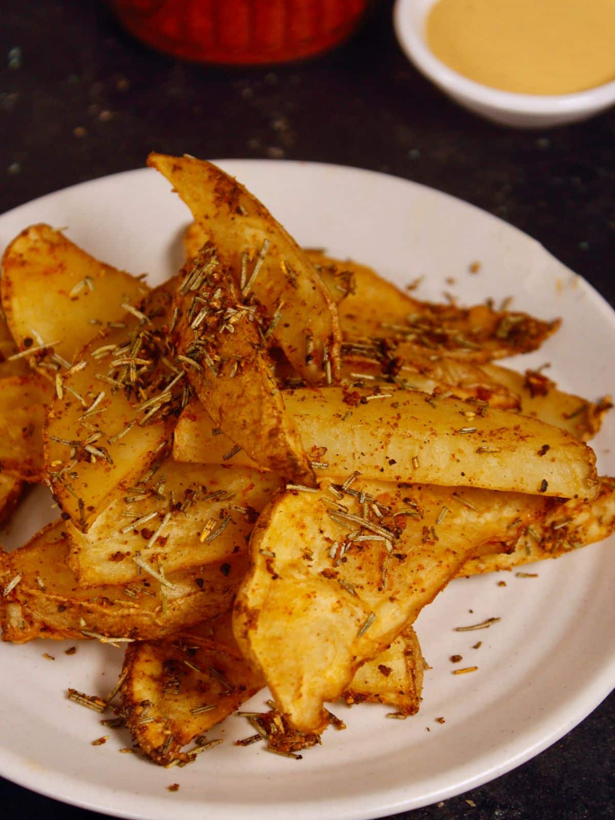 top view of air fried rosemary potato wedges