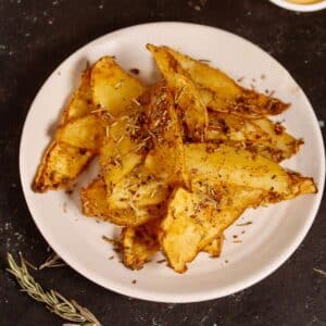 Featured Img of Air Fried Rosemary Flavored Potato Wedges