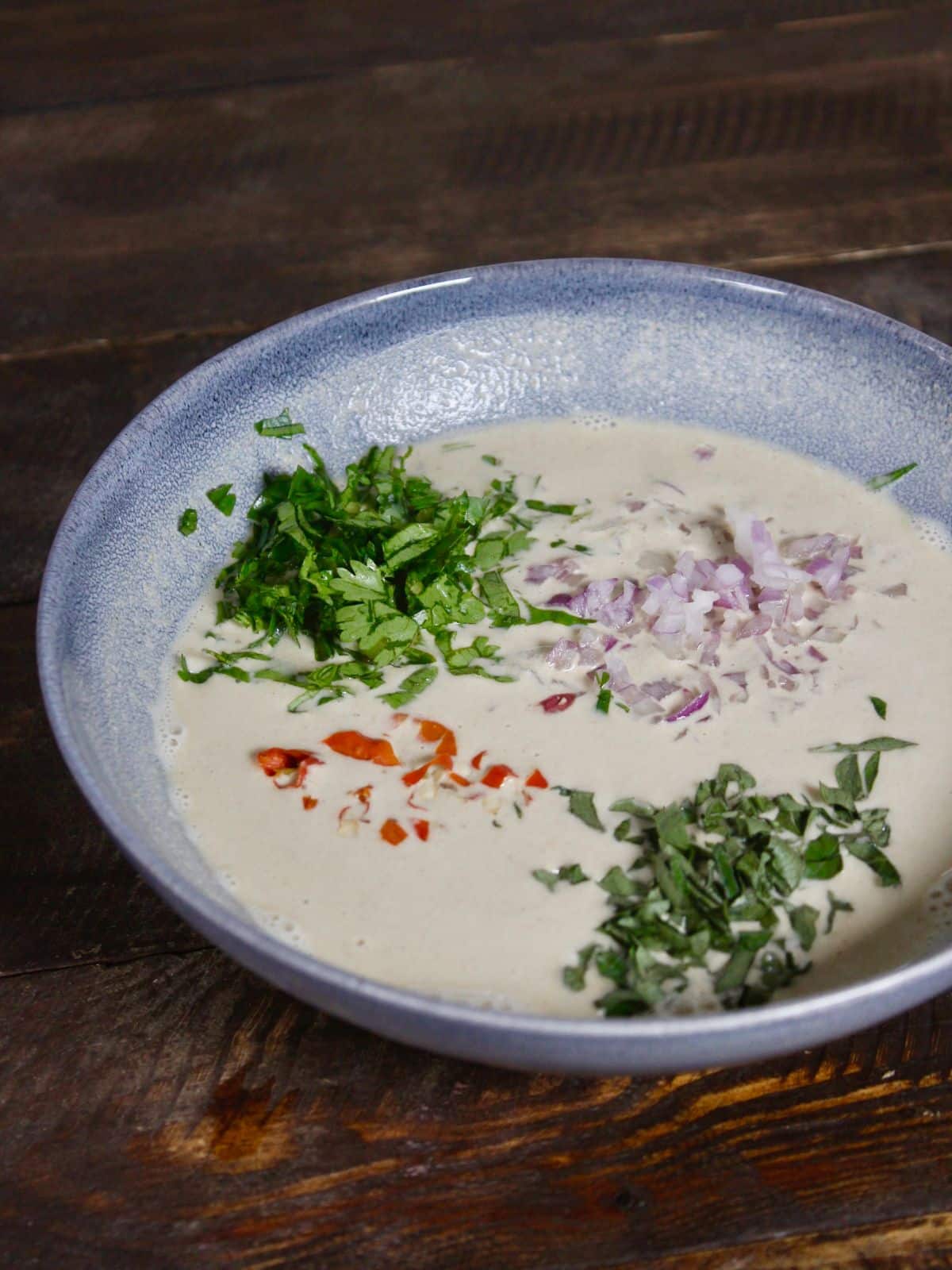 add all the ingredients into the millet paste 