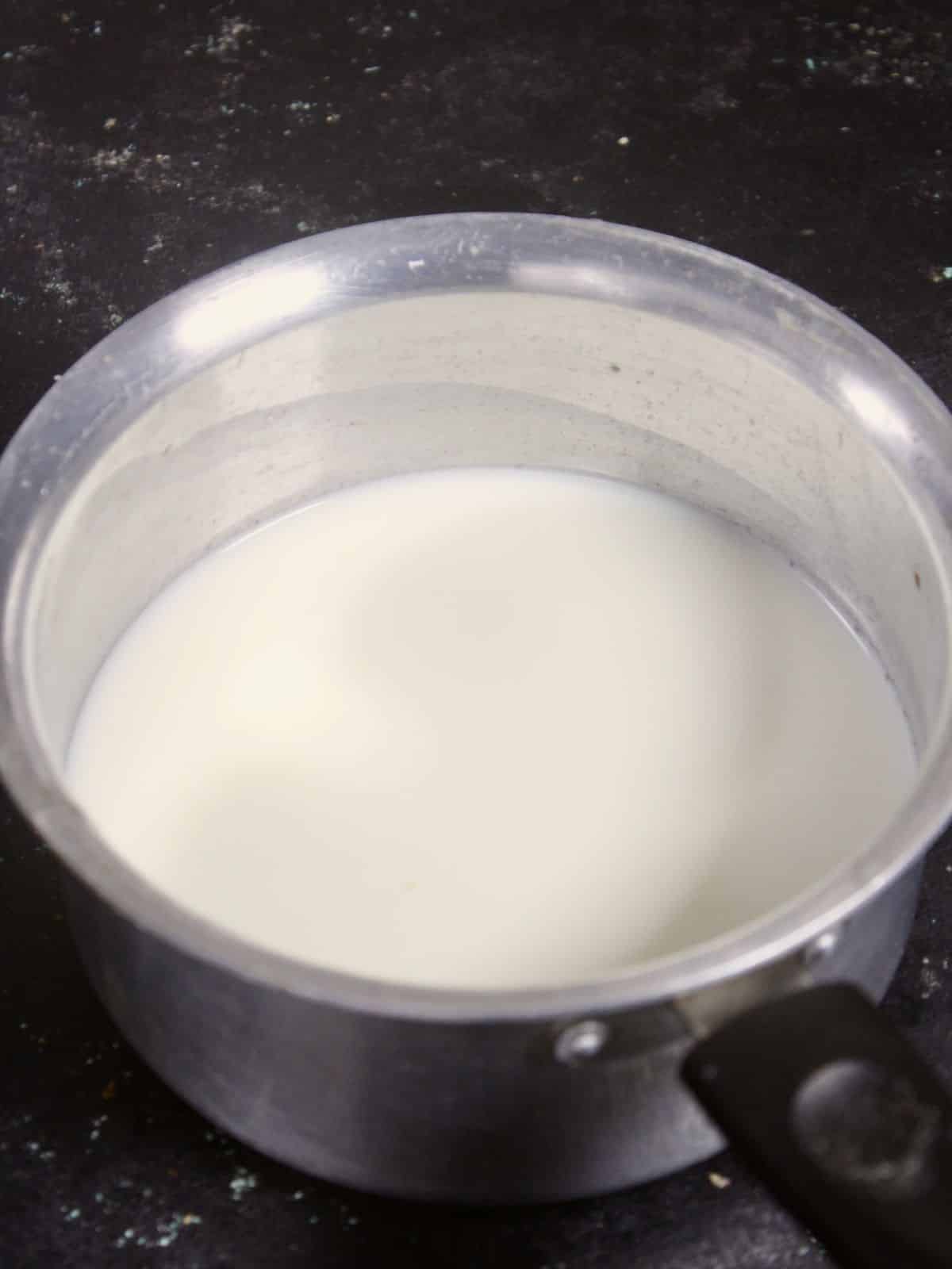 take milk in a saucepan and boil it 