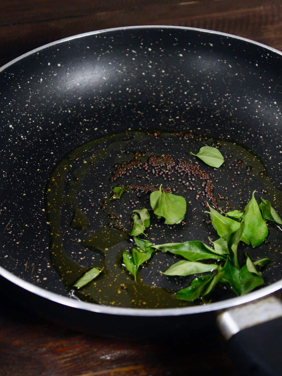 add all the ingredients for the tempering in a pan and saute 