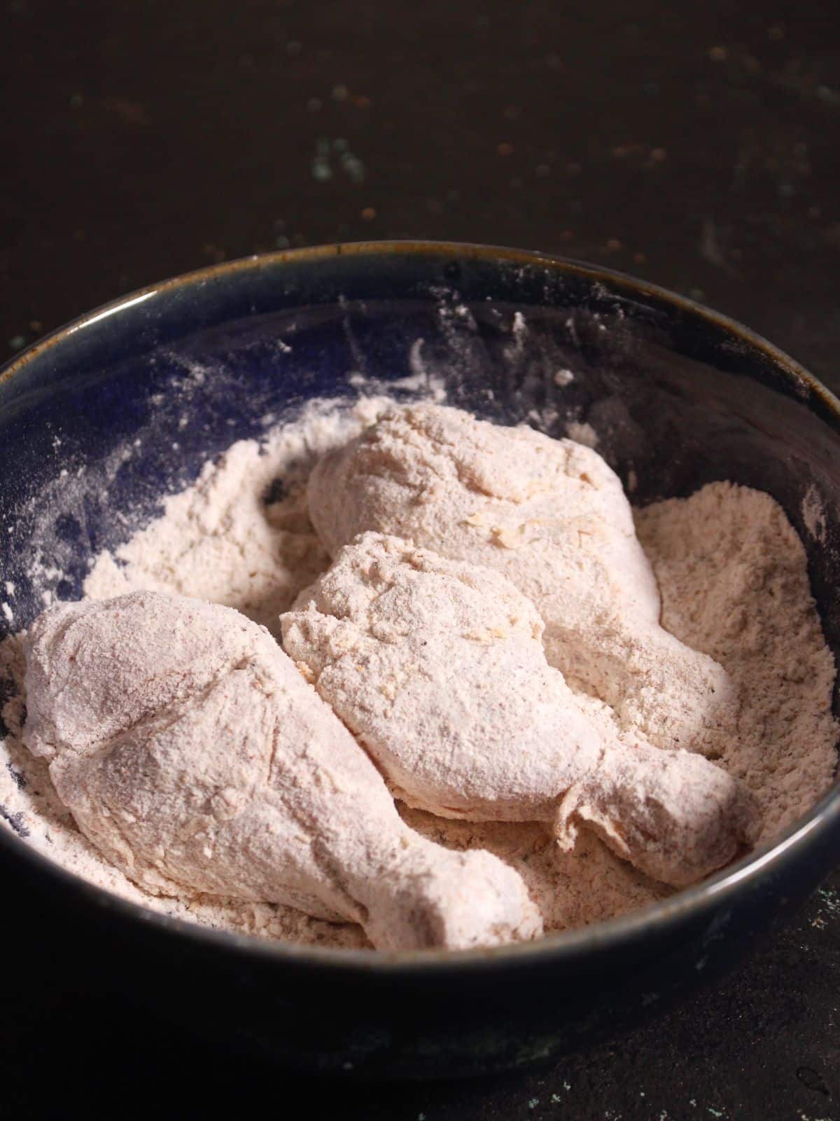 coat the drumsticks with the powdered spices 