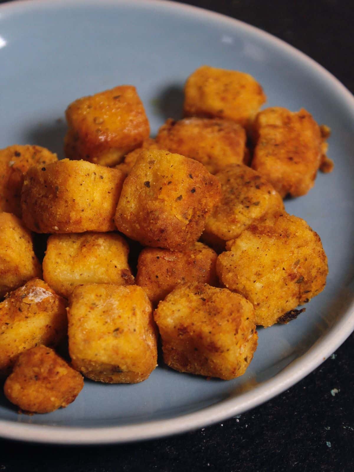 enjoy crisp air fried crispy paneer with chutney or ketchup