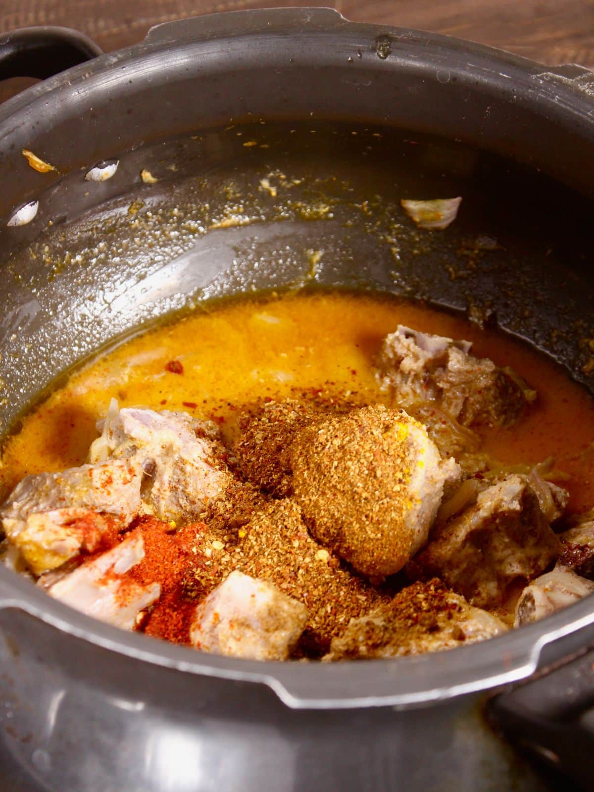 add powdered spices to the pot 
