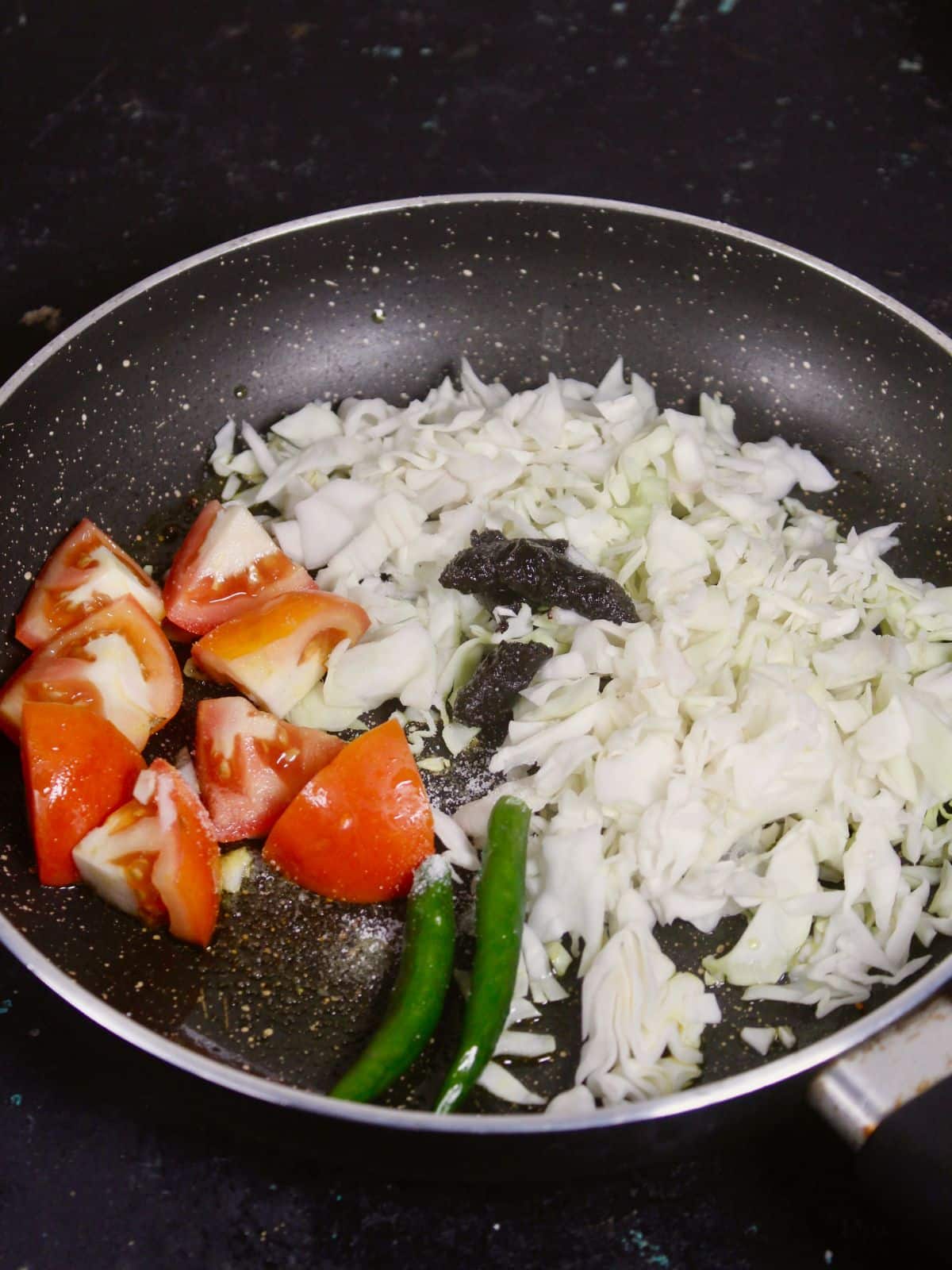 add all the chopped vegies into the pan