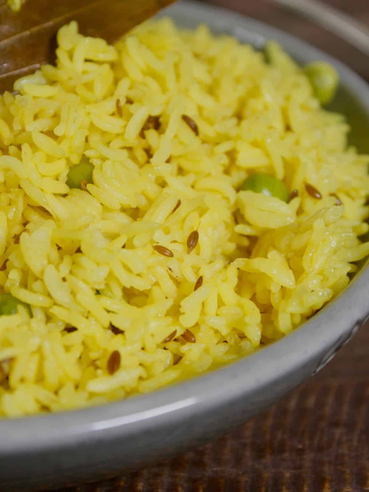 side view of ghee turmeric rice