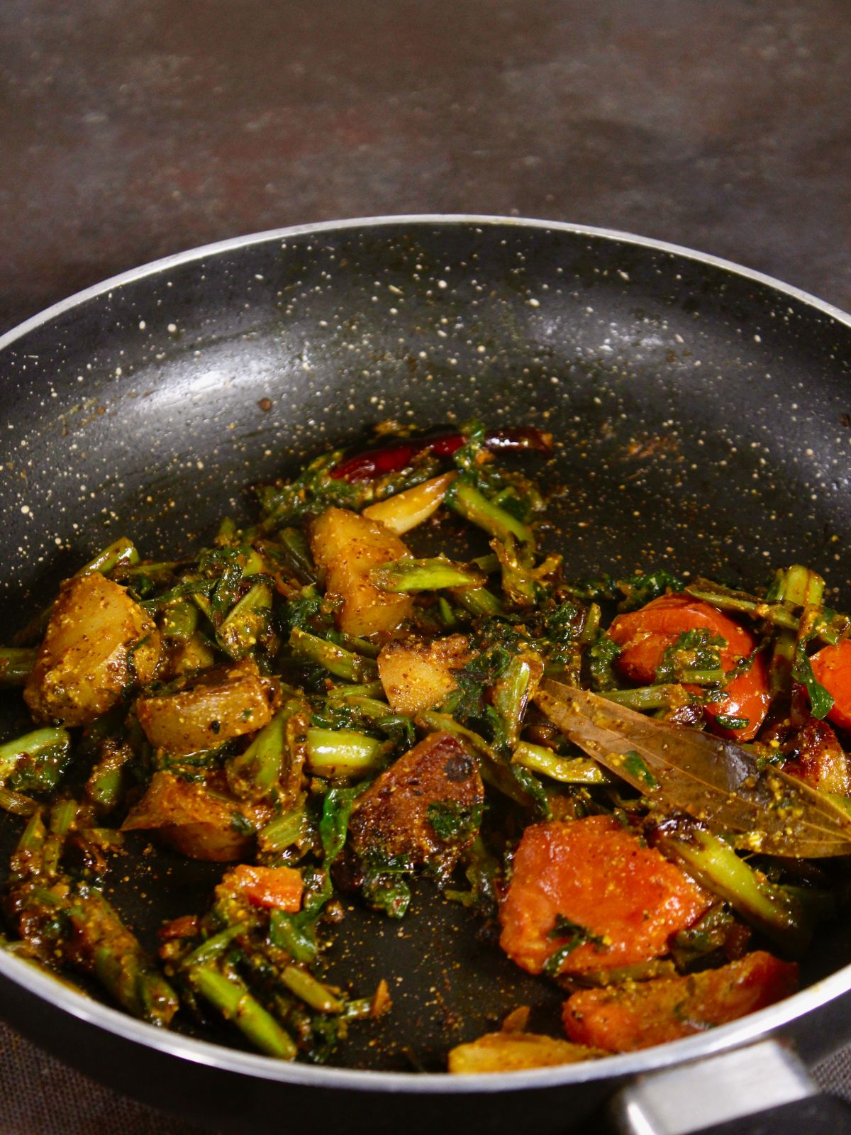 enjoy kasundi spinach with rice or roti 