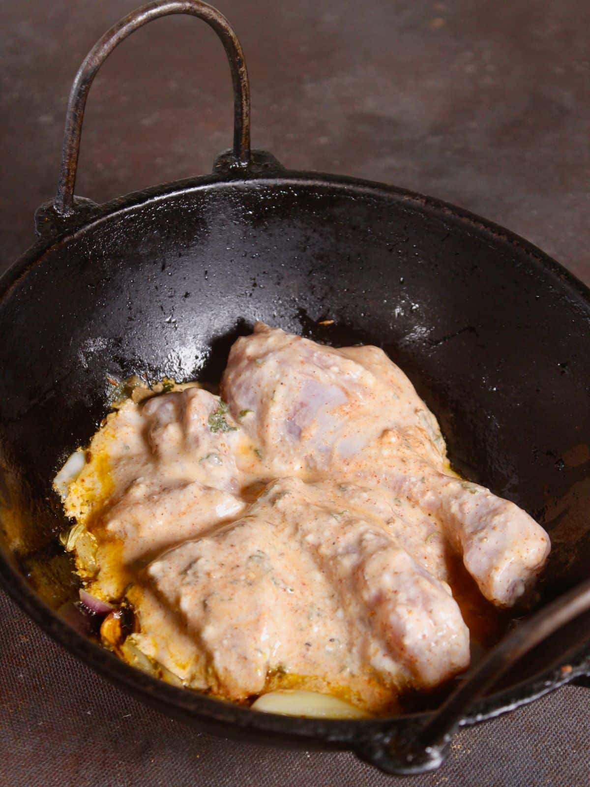 add marinated chicken to the pan 