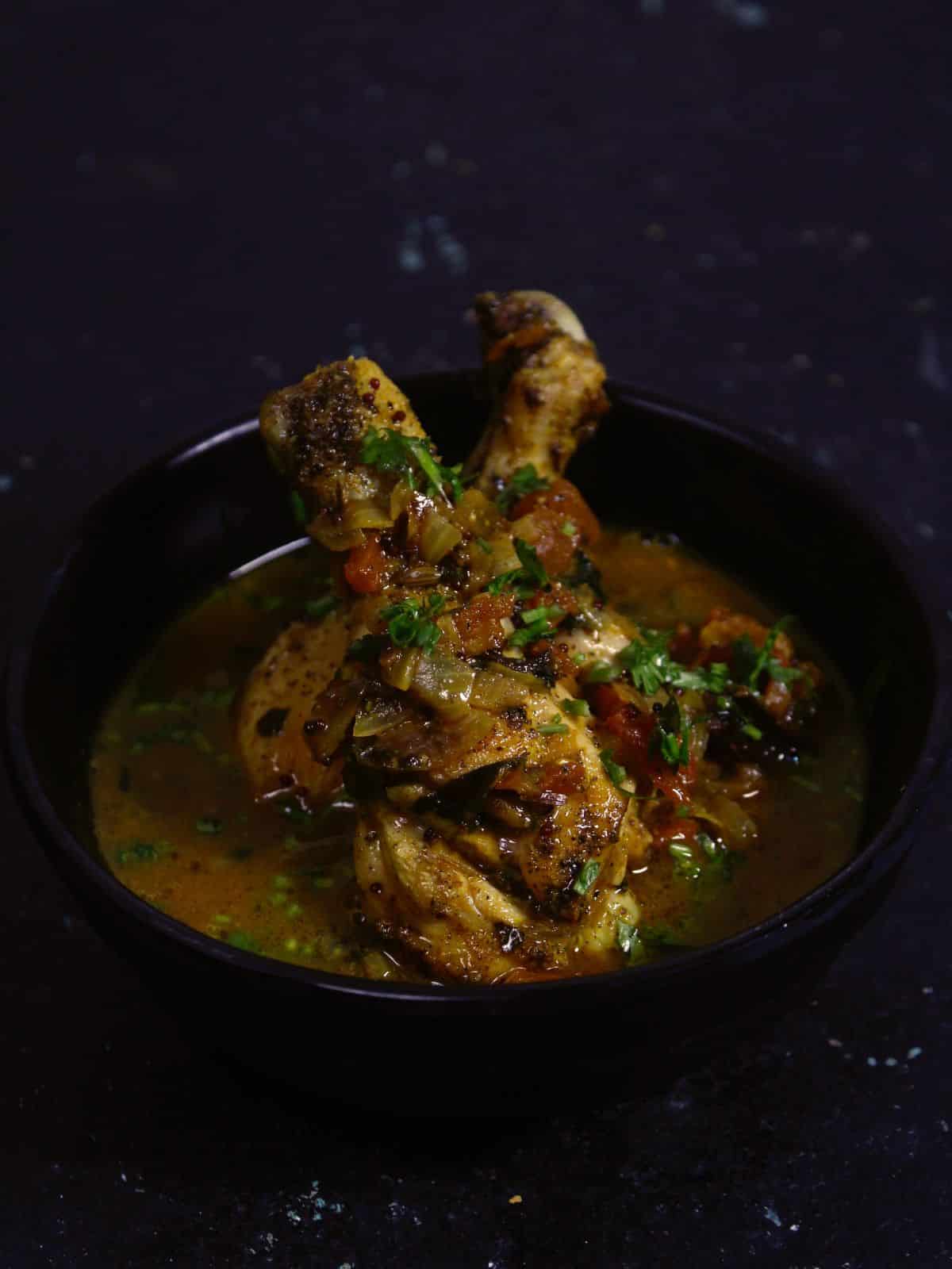 garnish with fresh coriander leaves & enjoy yummy pepper chicken leg roast  