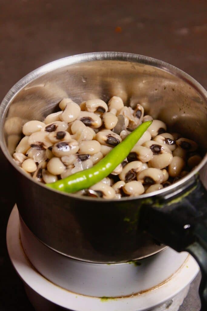 blend black eyed beans with green chilies into the blender 