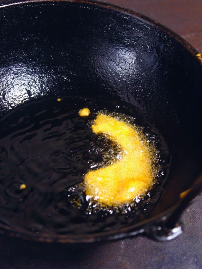 deep fry the coated pumpkin pieces